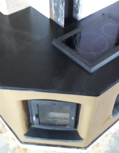 Cuisinière de masse d'angle avec colonne chauffante